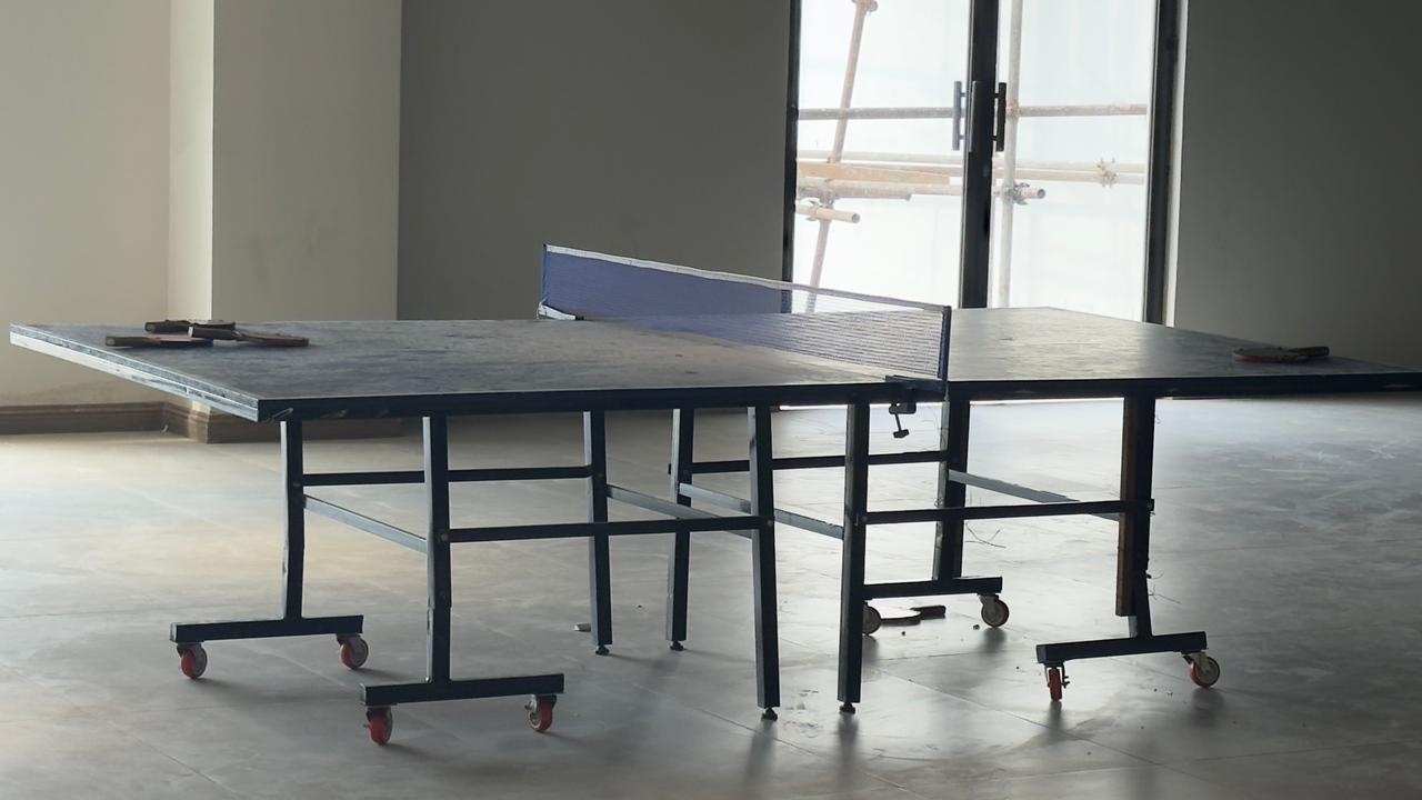 Indoor table tennis setup inside Silicon Village Smart City Capital recreational area with modern workspace environment